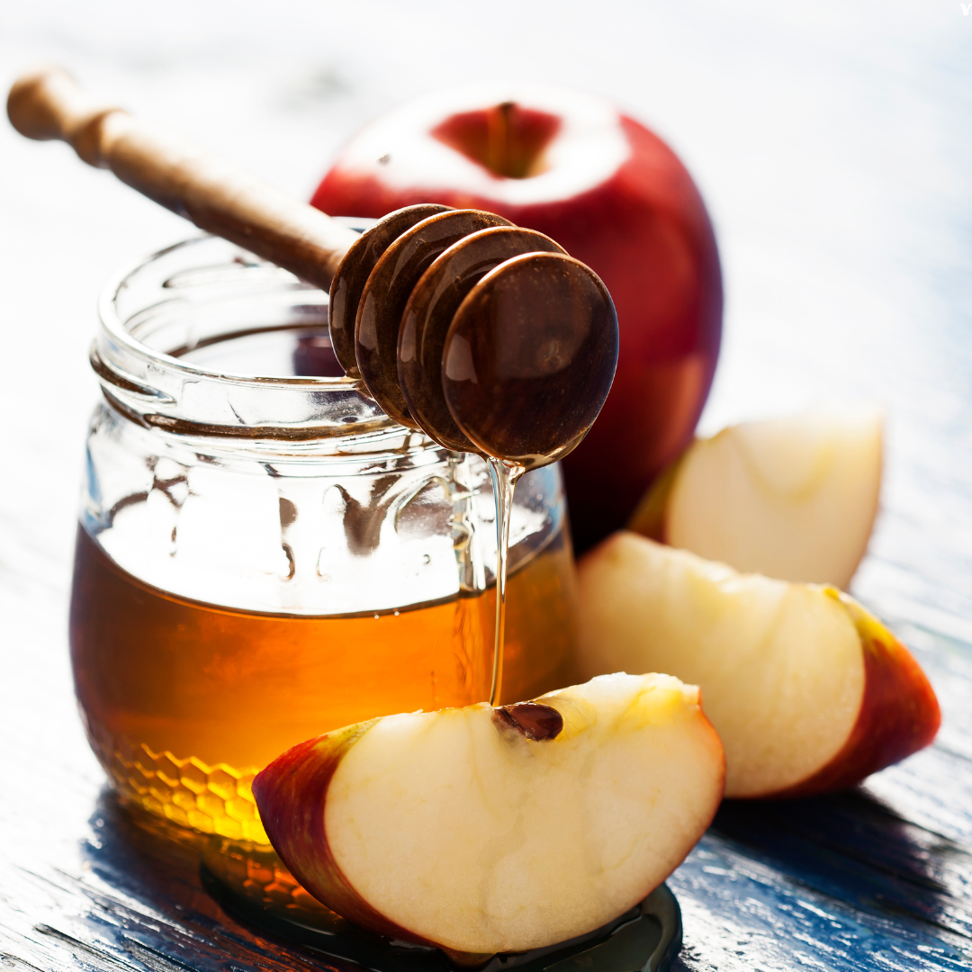 photo of apples and honey for Rosh Hashana